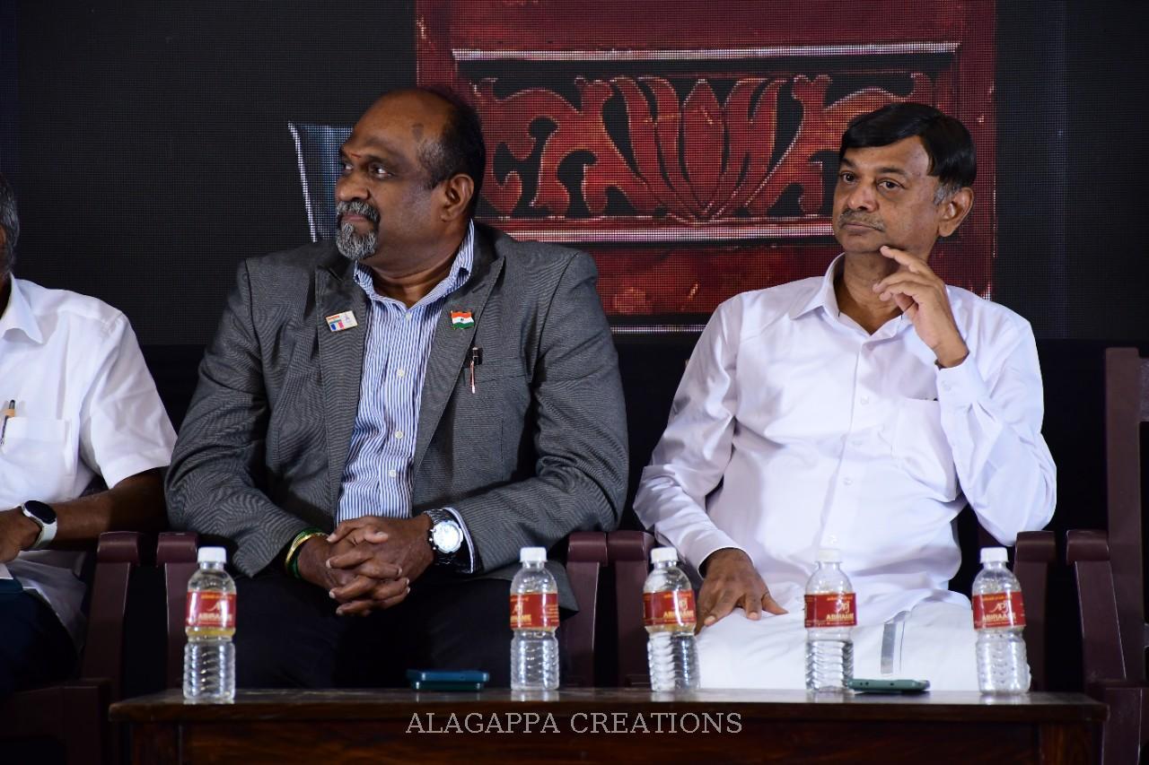 The dignitaries look on